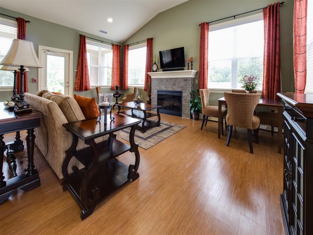 a living room with a couch and a table