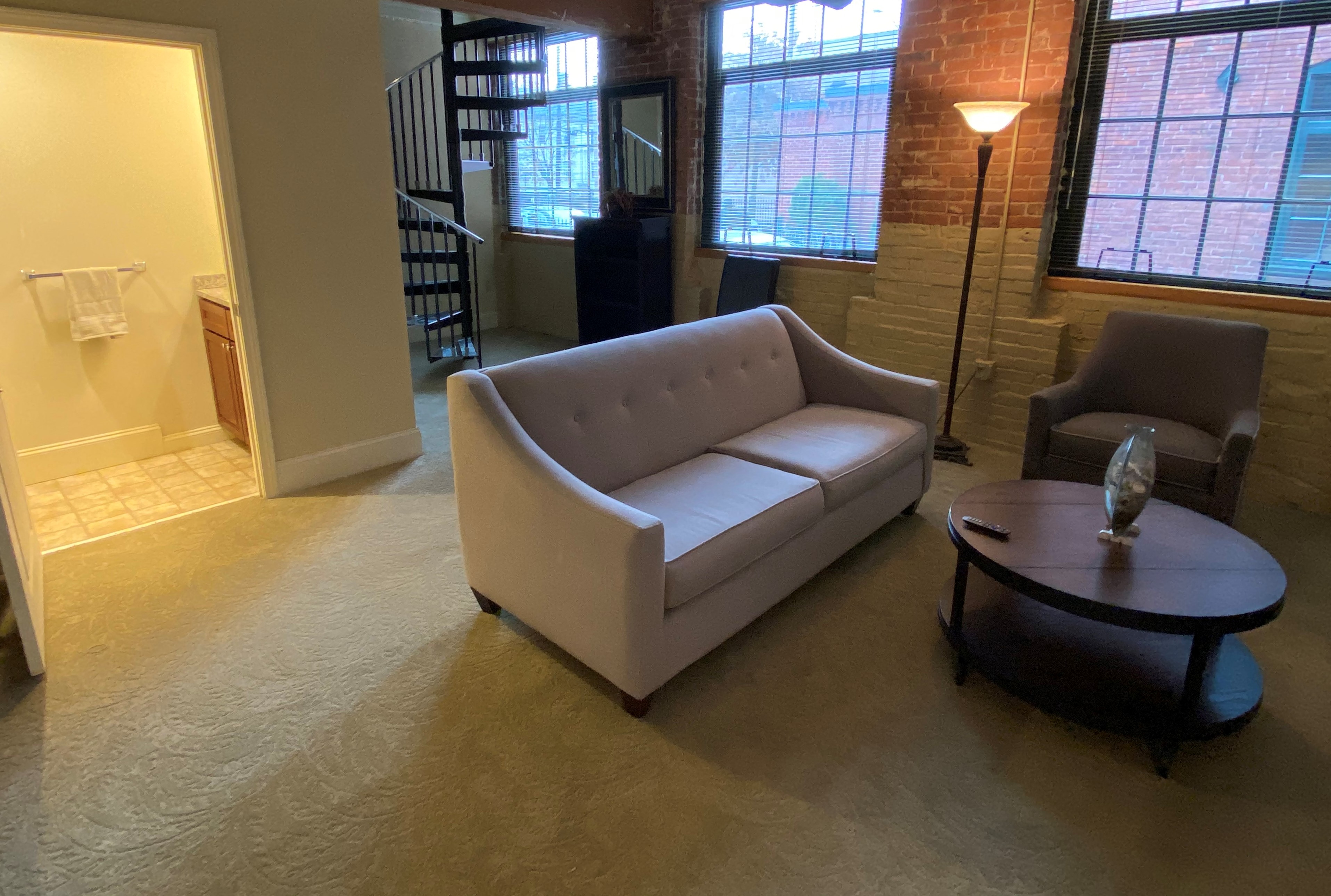 a living room with a couch and a table