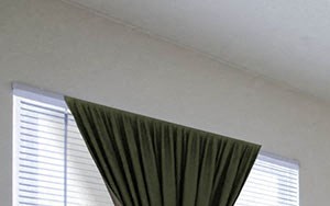 AzaleaCommons a bedroom with a bed and a ceiling fan