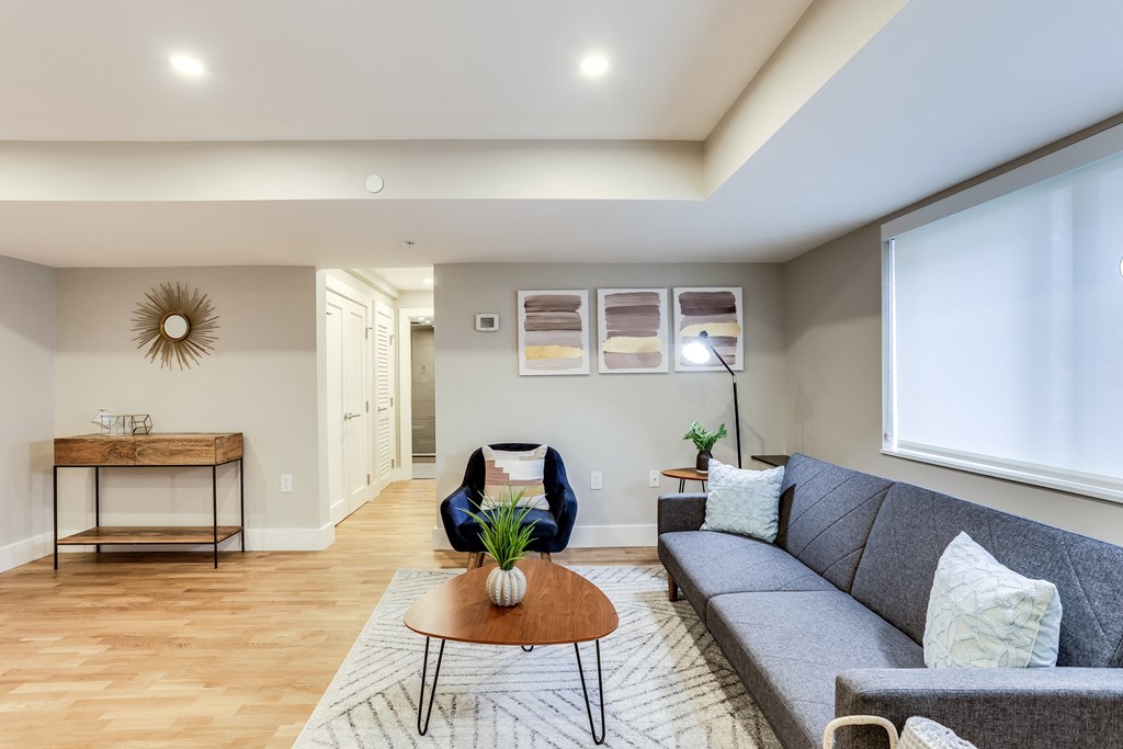 a living room with a couch and a coffee table
