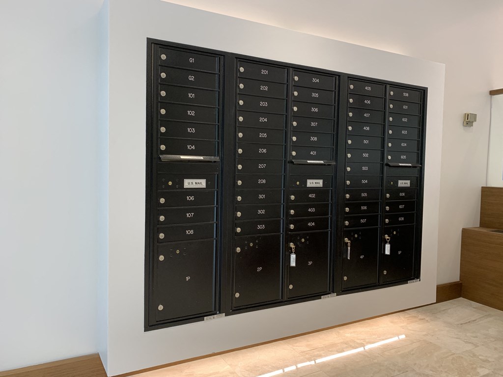 a bunch of lockers on a wall in a room