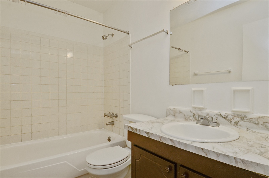 Updated bathroom finishes tie together the perfect apartment to rent in Indianapolis.