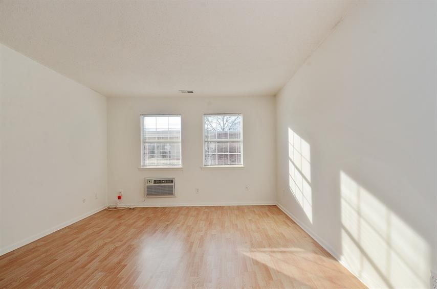 Some apartments feature hardwood floors at Pangea Fields in Indianapolis.