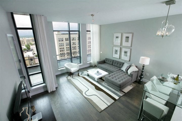 a living room with a couch and a table