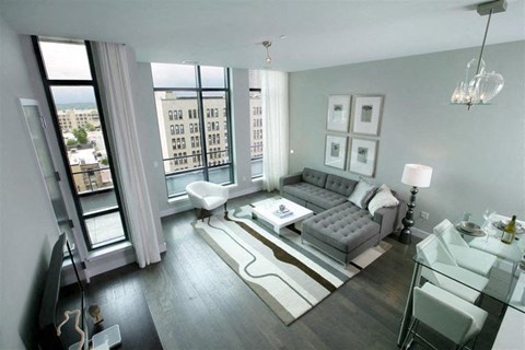 a living room with a couch and a table