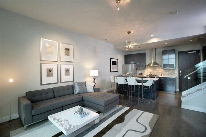 a living room with a couch and a table