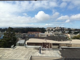 a view of a city from the roof of a building