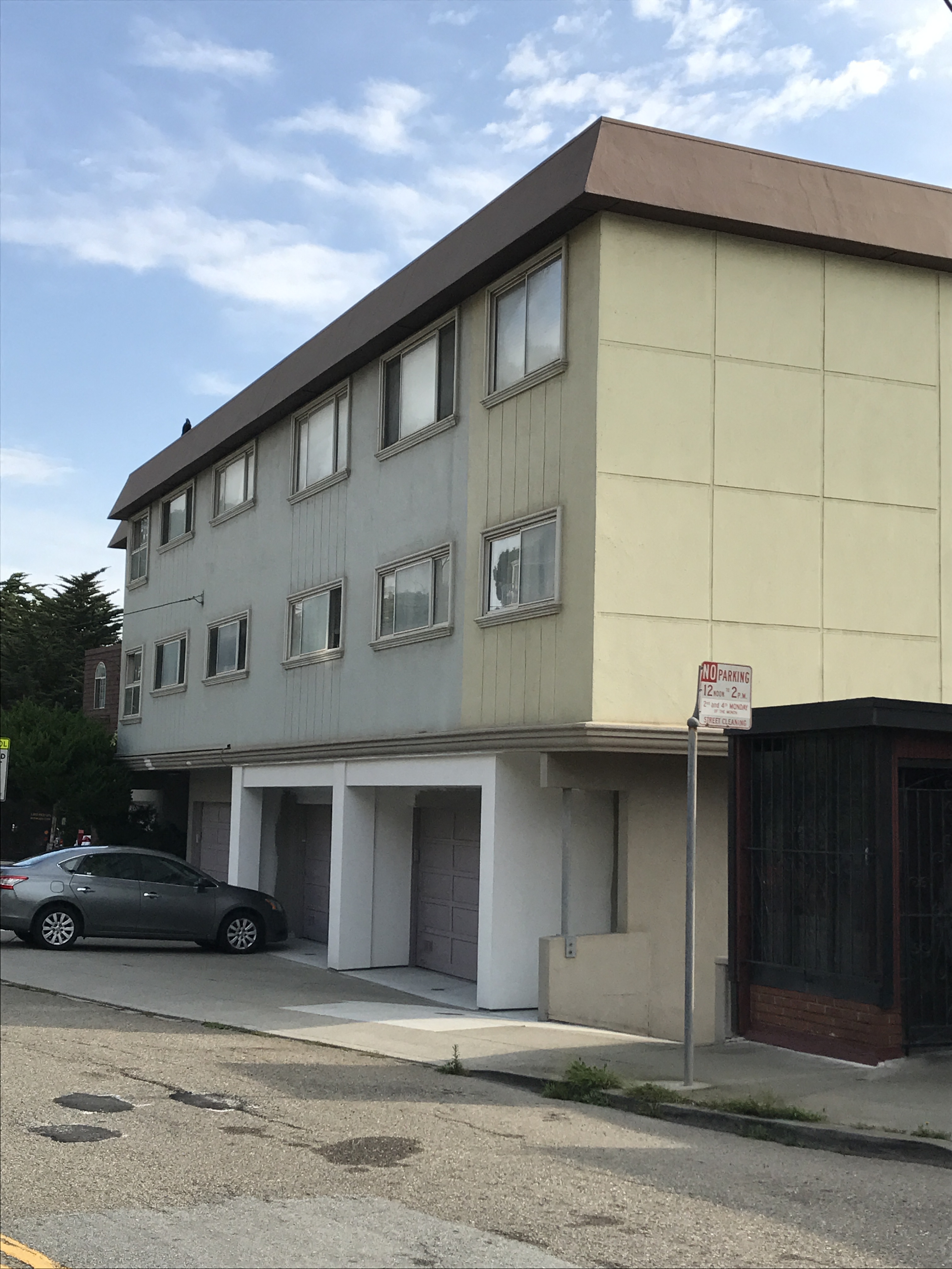 a building with a car parked in front of it