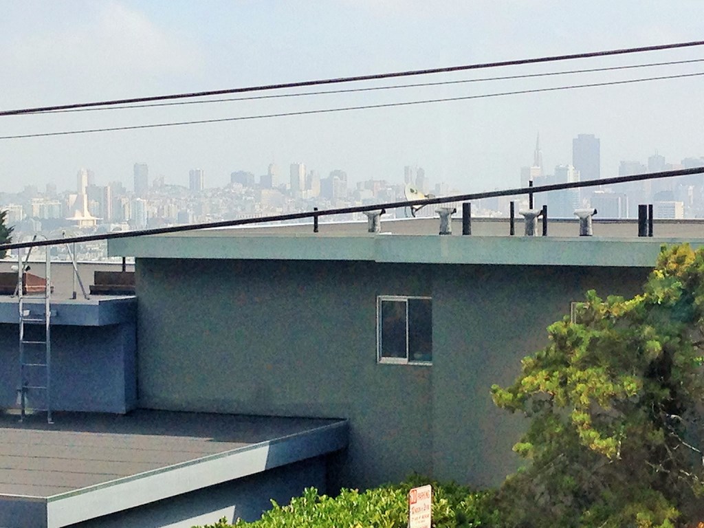 a house with a view of the city skyline