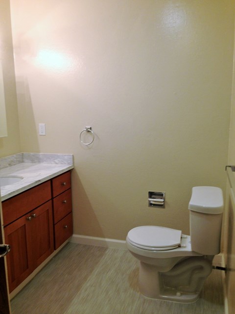 a small bathroom with a toilet and a sink