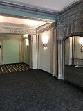 a large room with a large archway in the middle of it