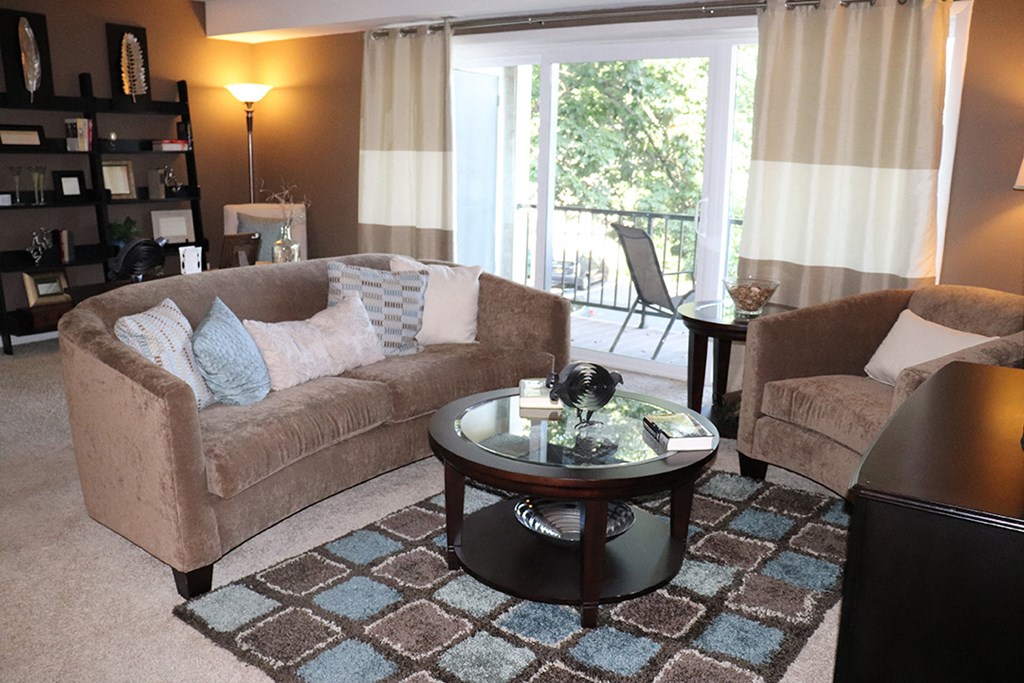 a living room with a couch and a table