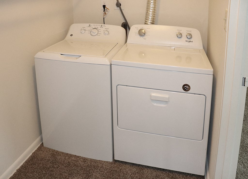 a washer and dryer in the laundry room of a home
