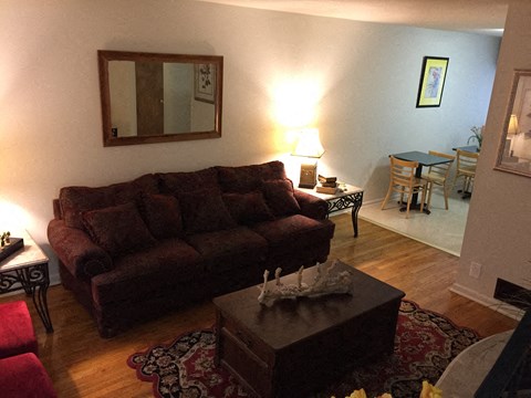 a living room with a couch and a table