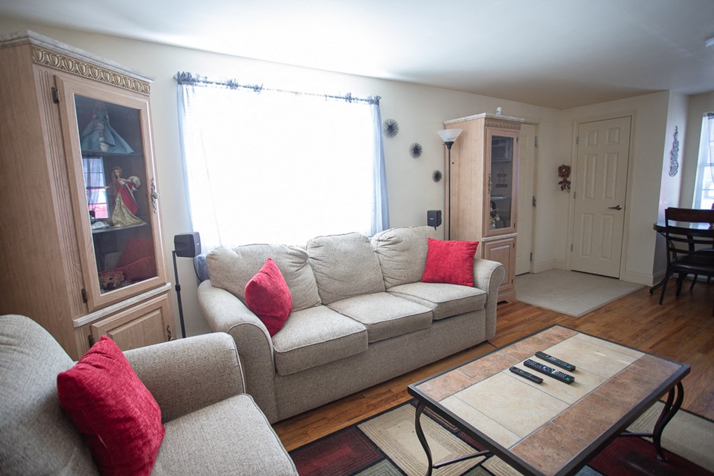 a living room with a couch and a table