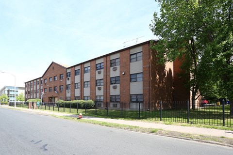 a large brick building on a city street