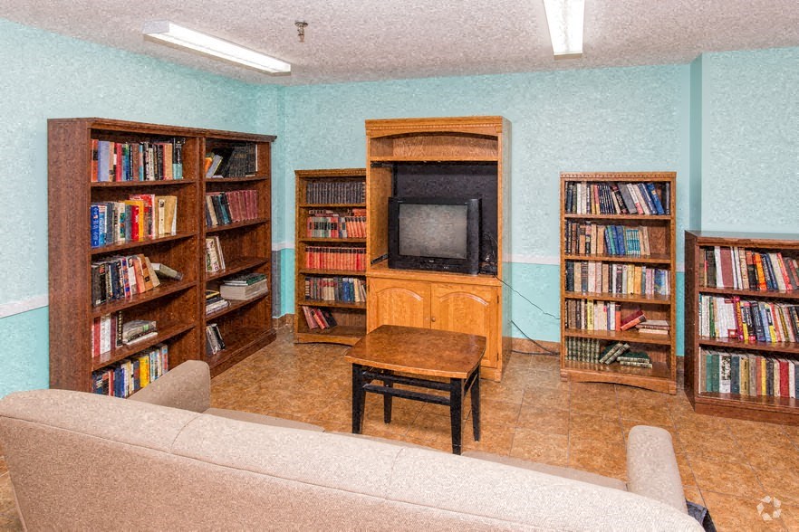 a living room with a couch and a television