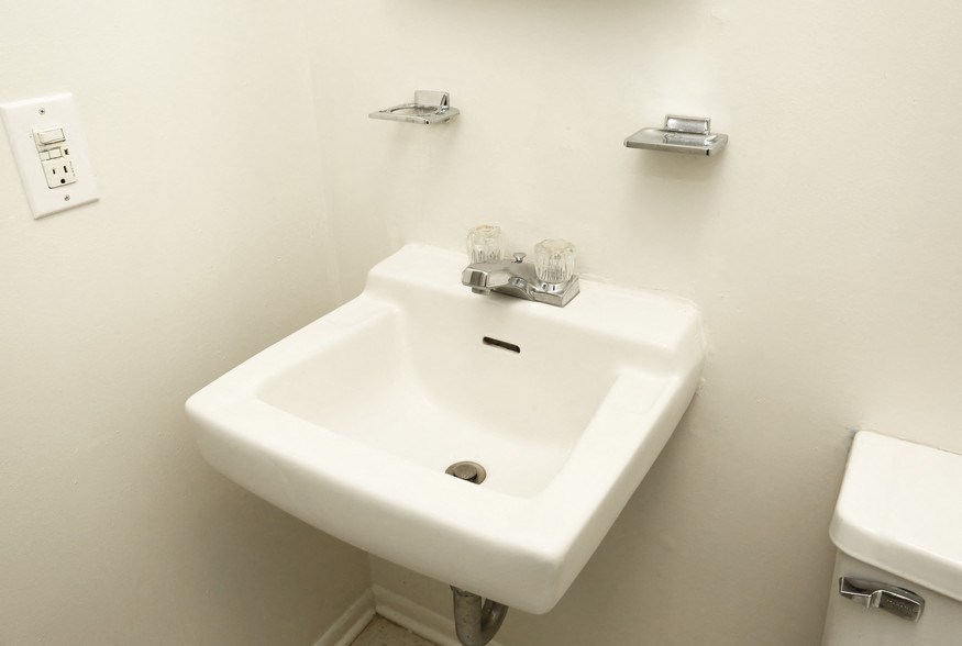 a bathroom with a sink and a toilet
