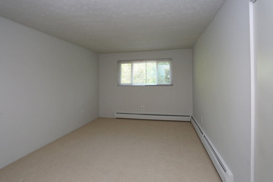 a empty room with a window in it