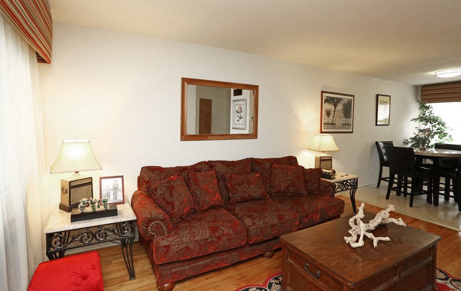 a living room with a couch and a table