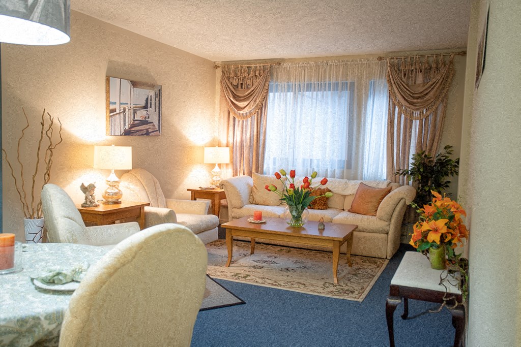 a living room with a couch and a table