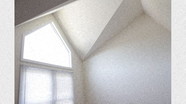 two windows in a room with white walls