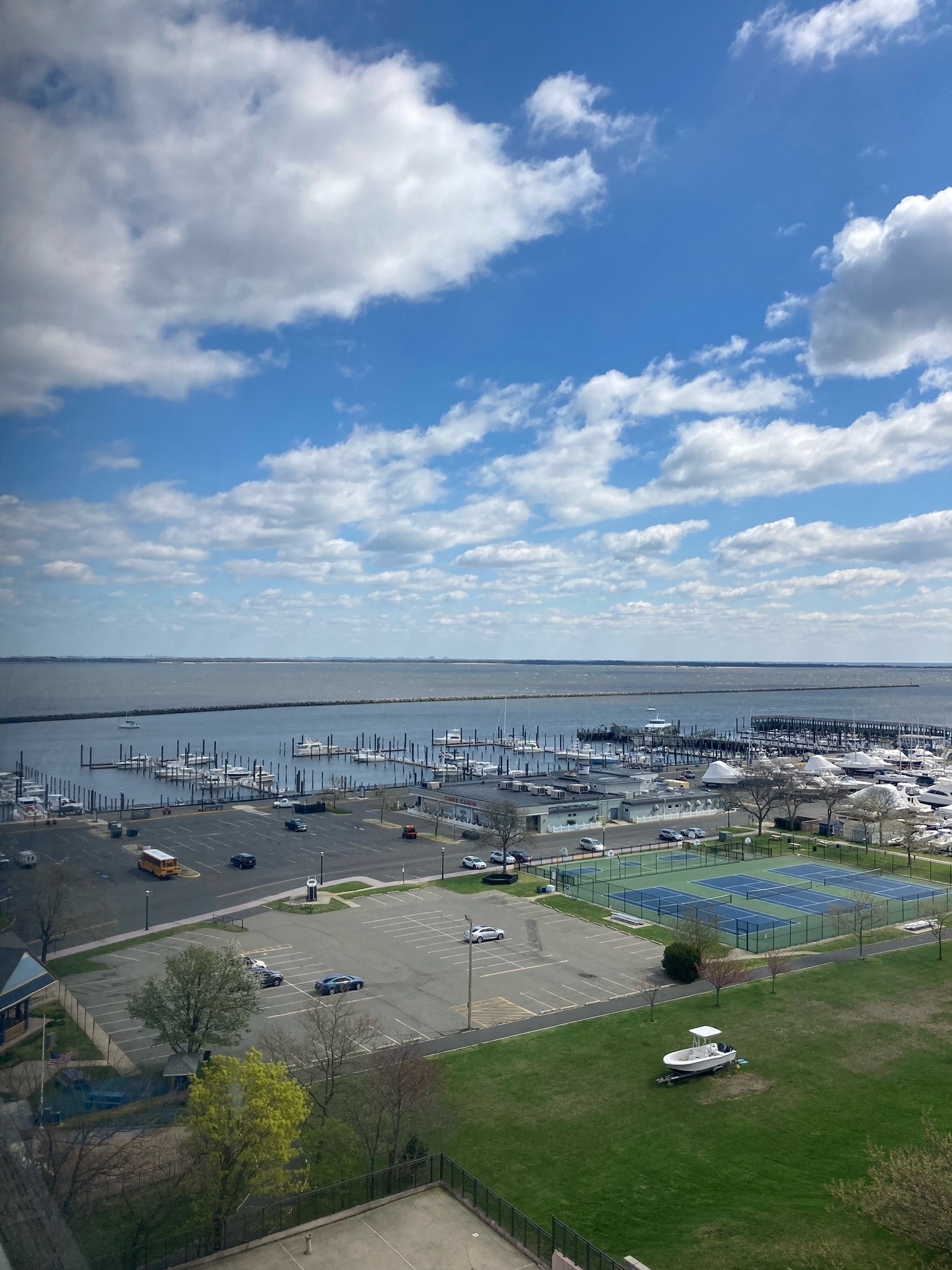 a view of the marina and the water from a balcony