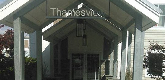 a building with a sign on the front of it