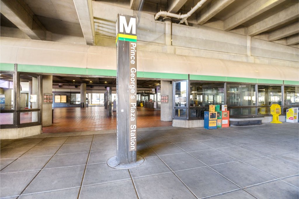 a sign on a pole in the middle of a building