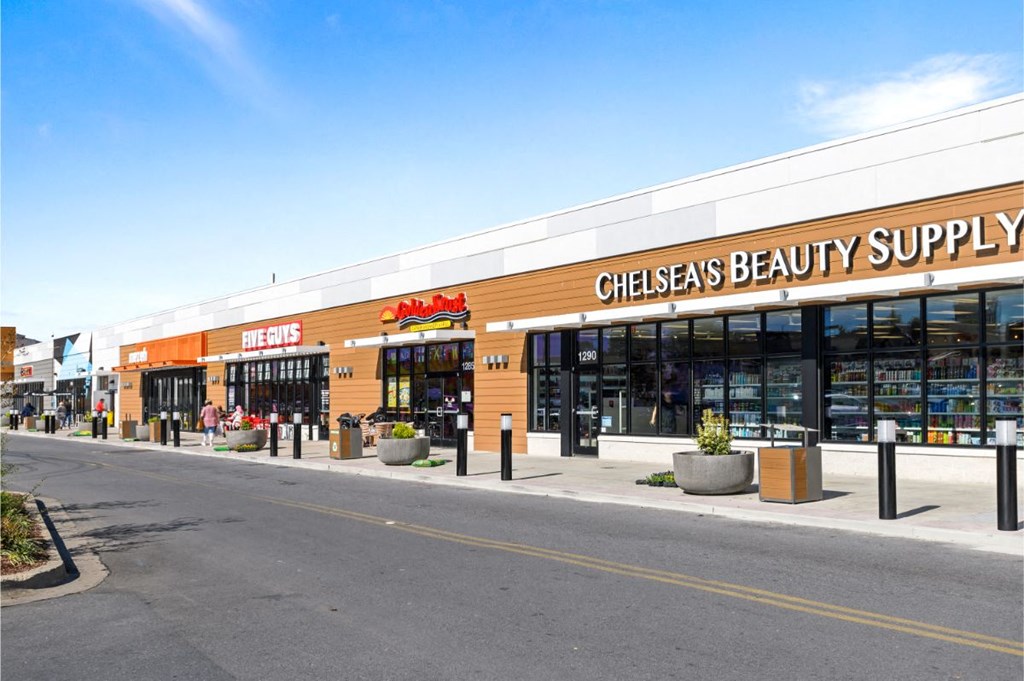 a beauty supply store on the side of a street