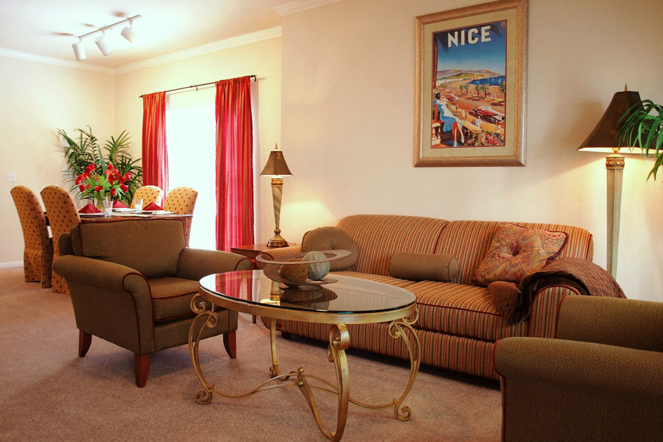 a living room with a couch and a table