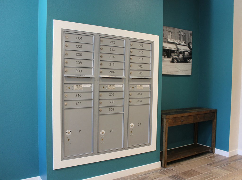 a locker room with a table and a blue wall