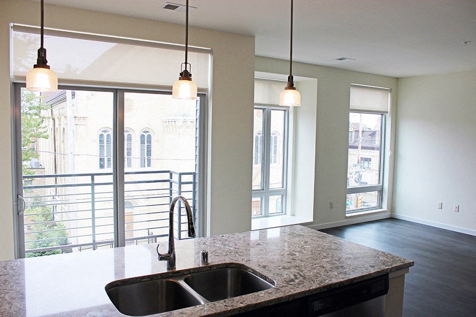a kitchen with a granite counter top and a sink