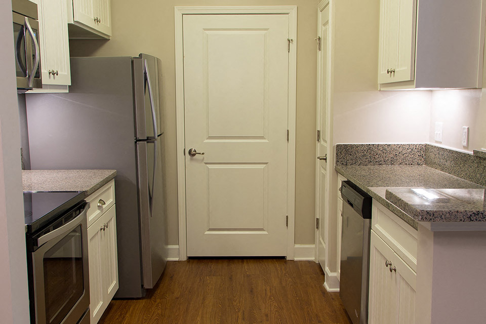 stainless appliances kitchen and white cabinets