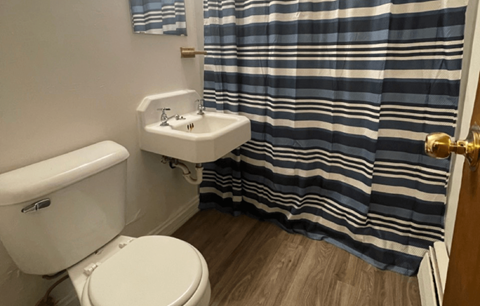 a small bathroom with a toilet and a sink