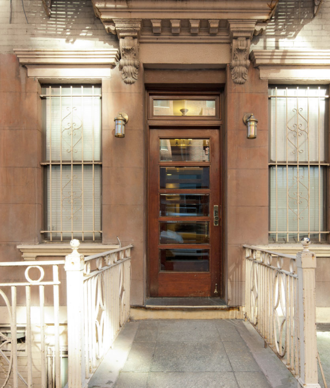 the front door of the apartment building