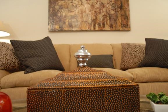 a living room with a couch and a coffee table