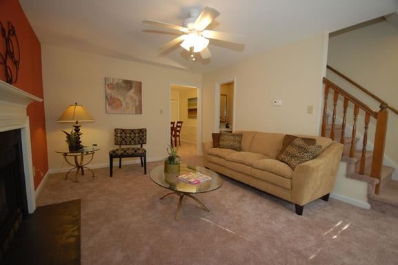 a living room with a couch and a table