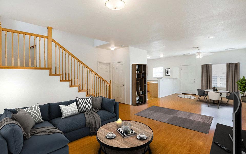 a living room with a couch and a table