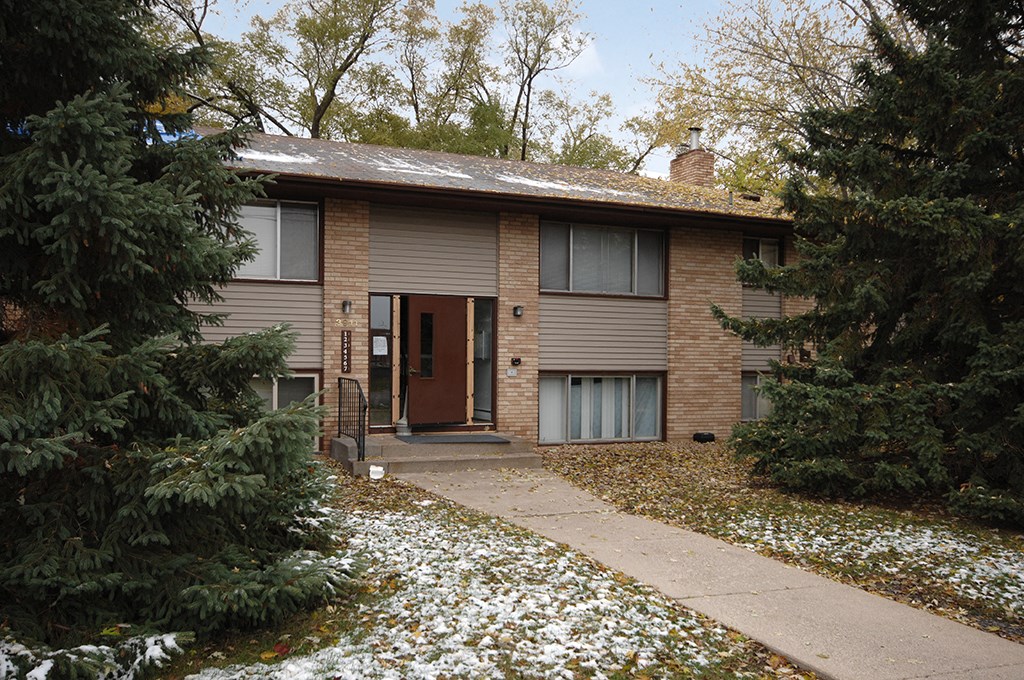 our house in the winter with snow on the ground