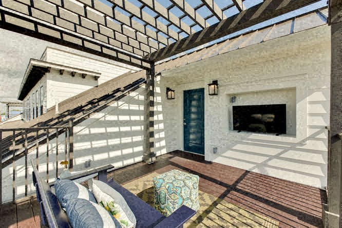 a living room with a couch and a fireplace