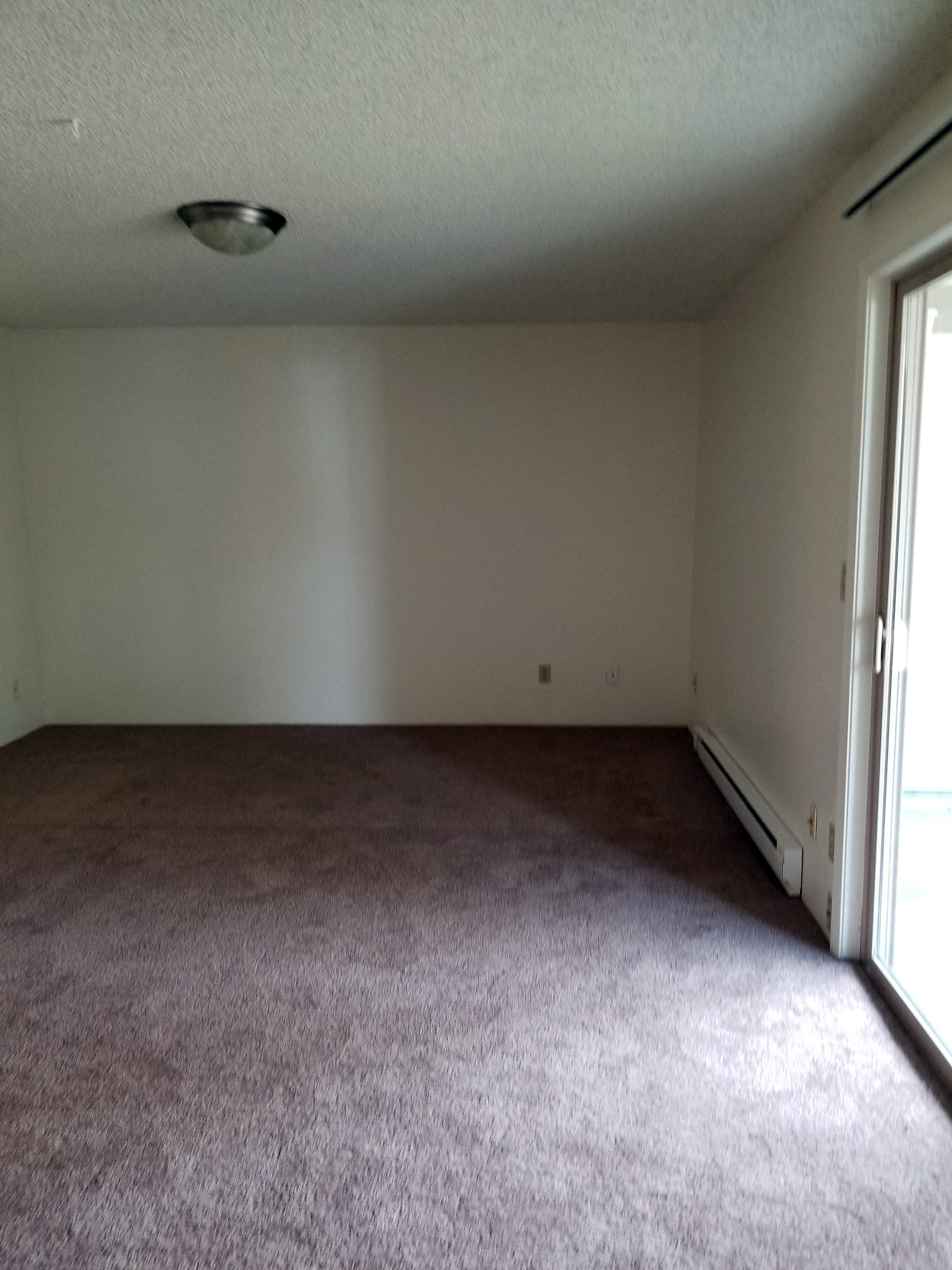 2 bedroom living room with sliding glass doors