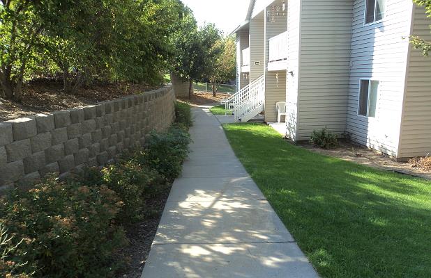 Retaining wall and sidewalk