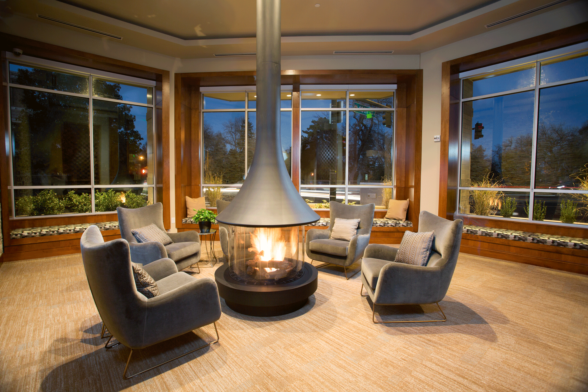 Fireplace with lounge seating at The York on City Park in Denver