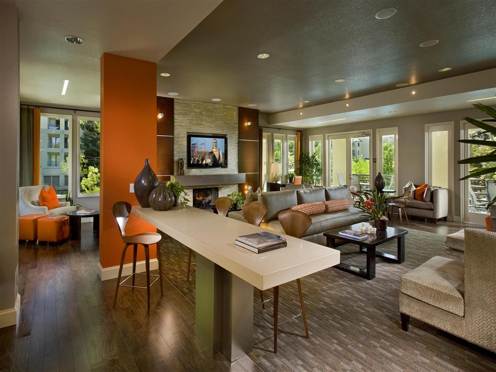 resident lounge with gourmet kitchen, TV's and fireplace