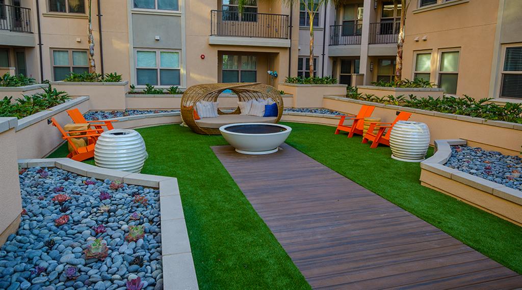 themed courtyards with water features and fire pits