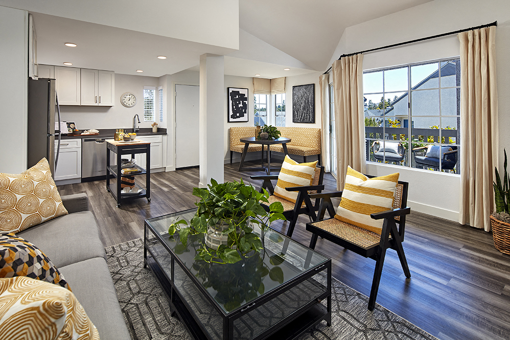 a living room with a couch and a table