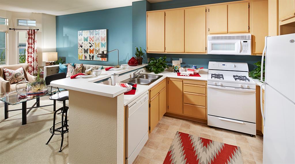 Whirlpool kitchen appliances, breakfast counter and kitchen pantry