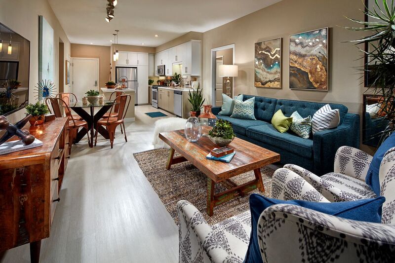 Wood-style flooring throughout the living and dining areas