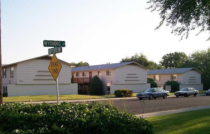 a street sign in front of a house